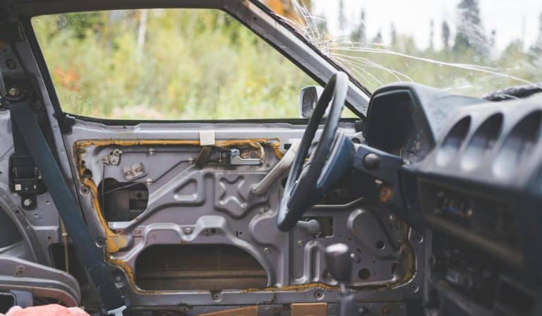 Uber Lyft accident lawyer San Antonio – passenger documenting crash evidence